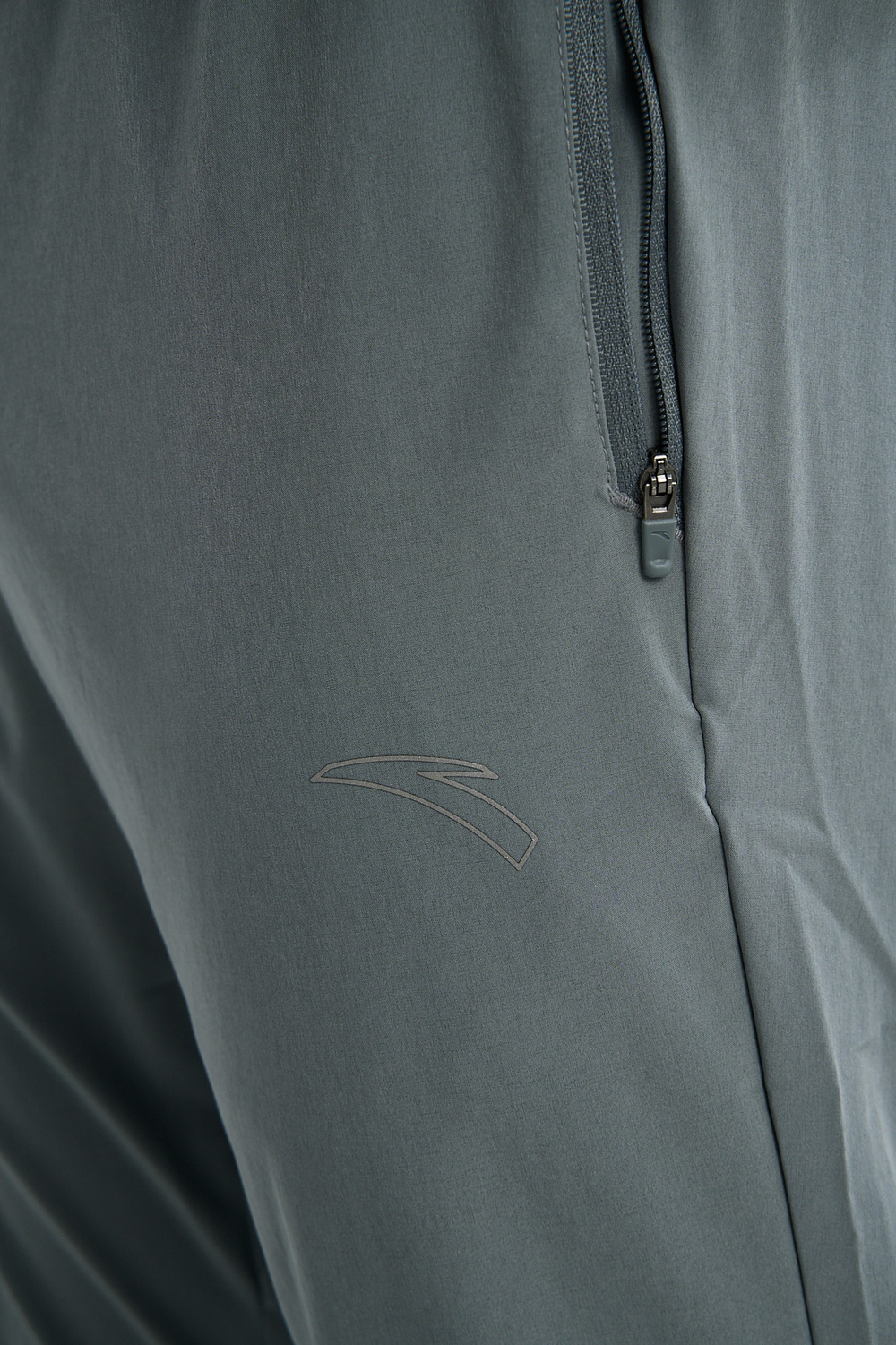 Брюки текстильные ANTA RUNNING Woven Track Pants
