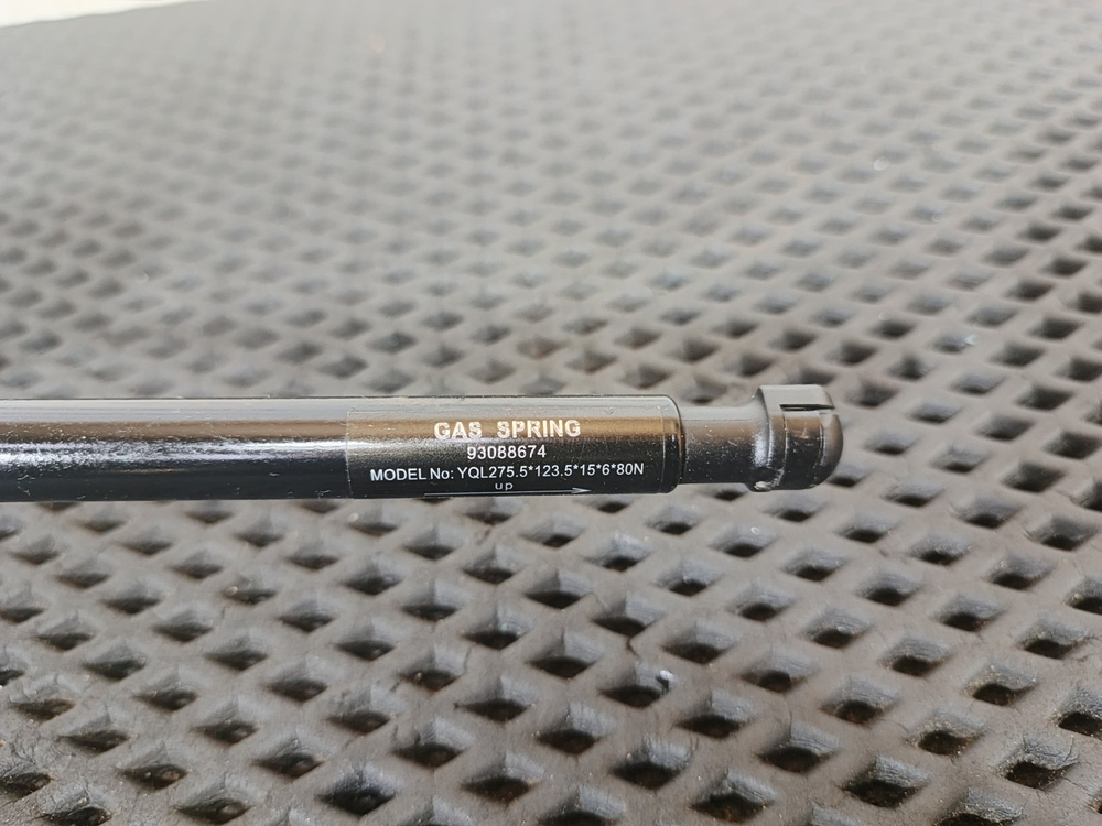 Амортизатор ящика вещевого 2023г.