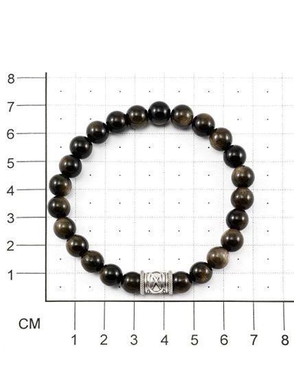 Фото браслета из обсидиана с руной Ансуз на размерной сетке.