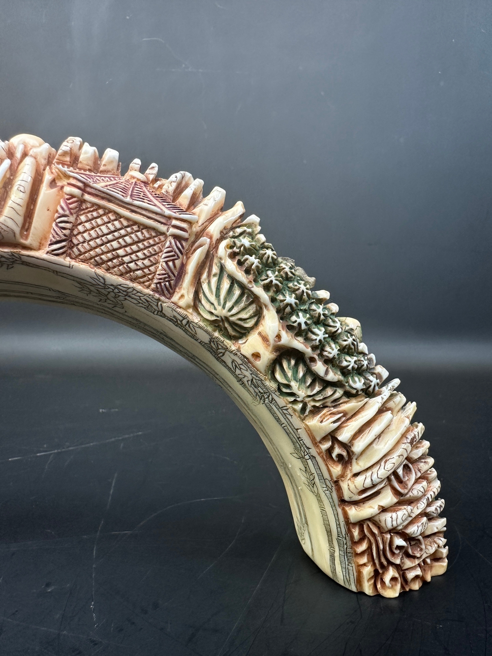 Резная композиция из клыка бегемота