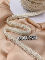 Тесьма белая (молочная) плетеная с биконусами