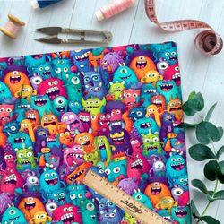 Ткань премиум флис разноцветные монстры