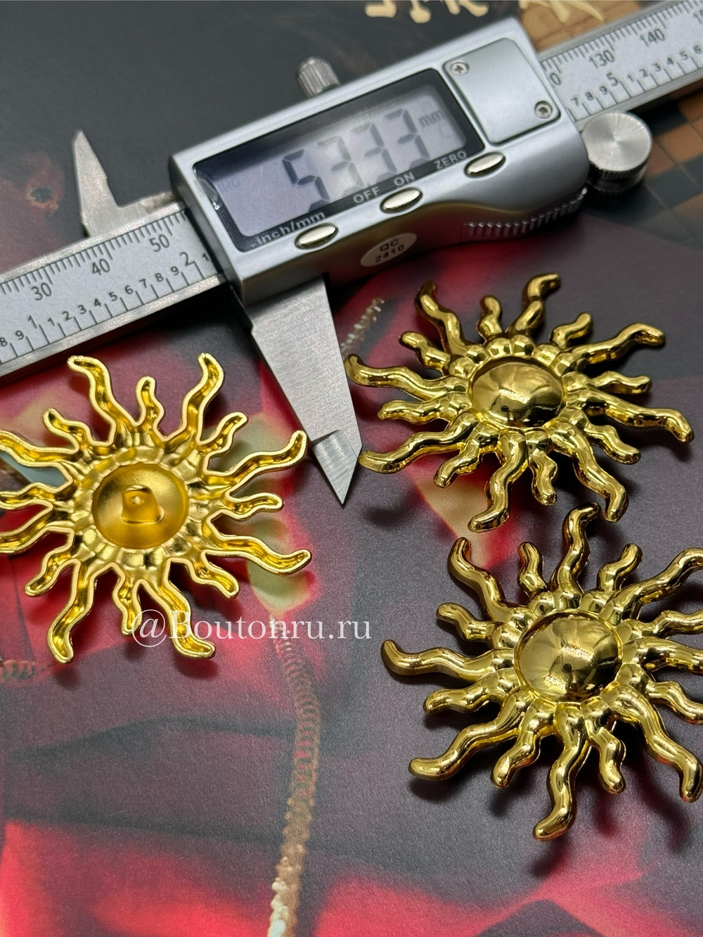 Пуговицы Скиапар. золотистые в форме солнца