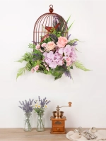 Композиция настенная с цветами в металлической клетке