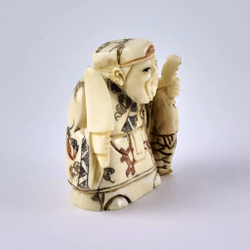 Нэцкэ Дзюродзин со священным капром и тесаком