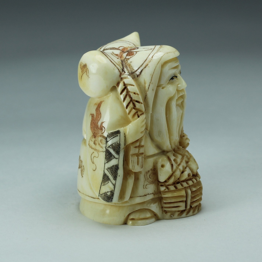 Нэцкэ Фукурокудзю с тыквой горлянкой и корзиной рыбы