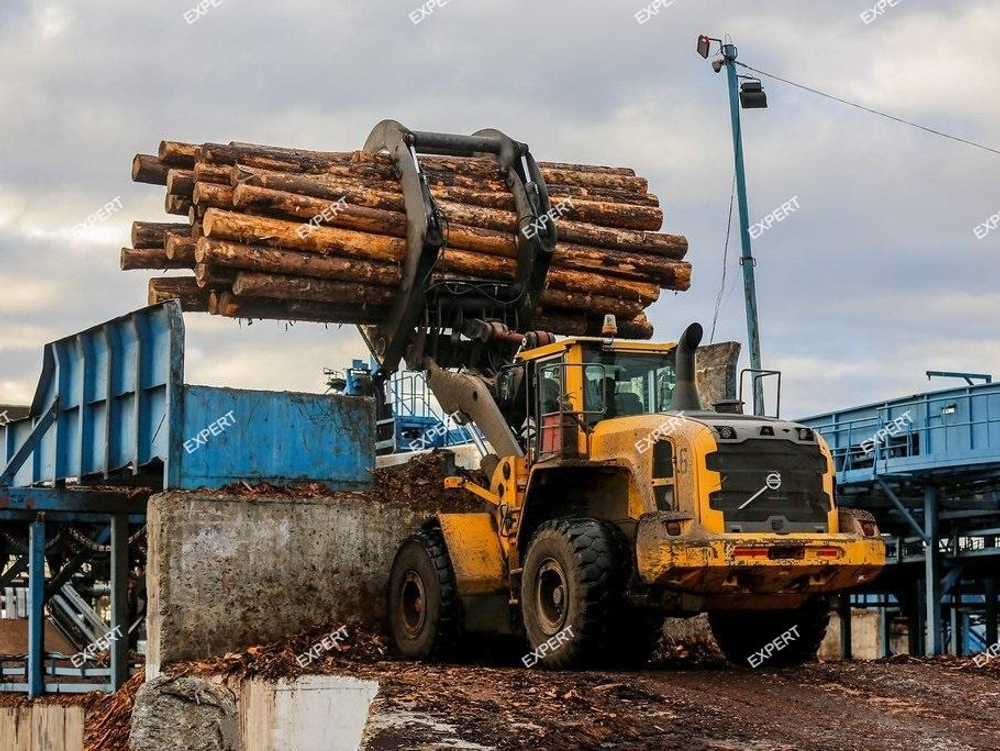 Бревно захват на Экскаватор-погрузчик New Holland