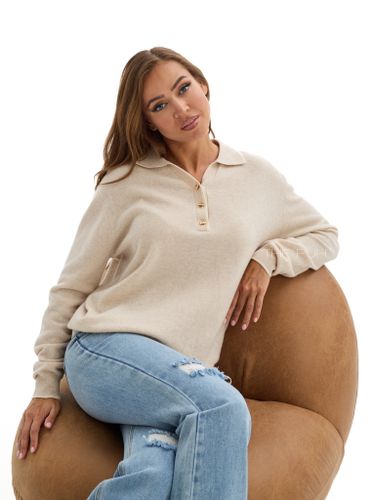 Бежевое поло с длинным рукавом из шерсти