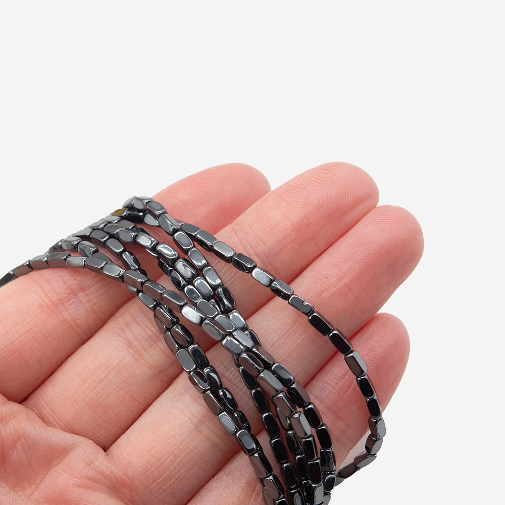 Гематин (гематит), оттенок "Gun Metal", рис с гранями, 2*4мм