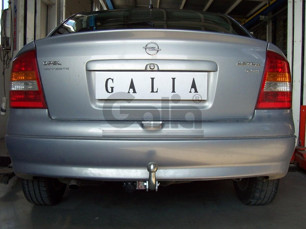 Оцинкованный фаркоп на Opel Astra G хетчбек 3/5 дверей, седан, купе, кабриолет 1998-2004, номерной знак на задней двери (без электрики), Galia O008A