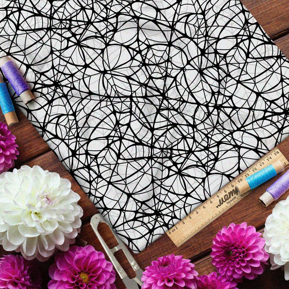 Ткань кулирная гладь мелкая чёрная паутина на белом фоне