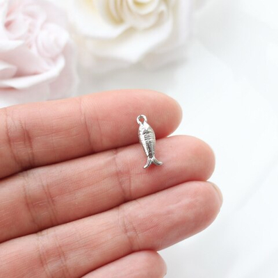 п047-р Подвеска "Маленькая рыбка" 15*5мм, родий