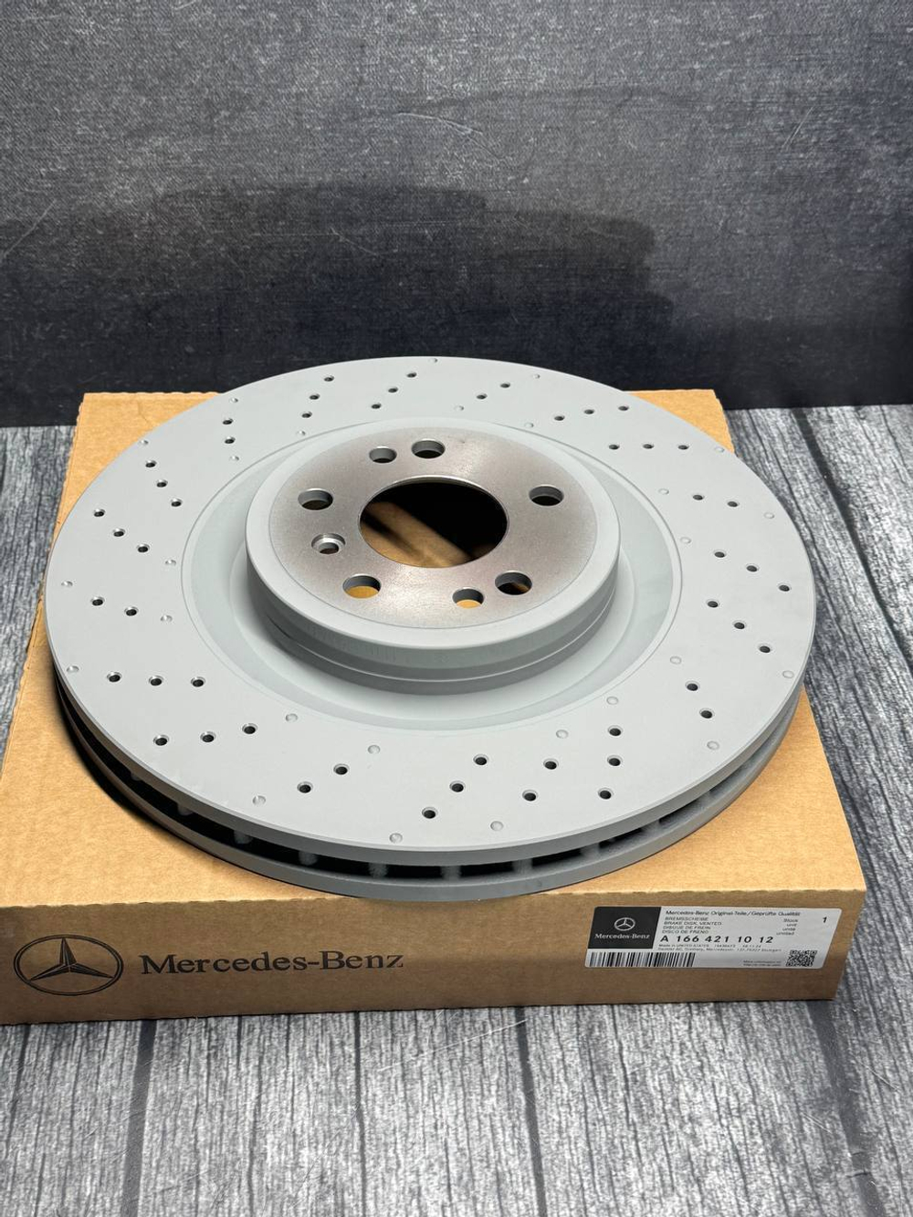 Тормозной диск передний Mercedes-Benz A1664211012