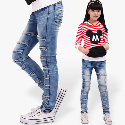 Джинсы утепленные с бахромой на декоративных строчках