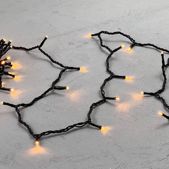 Светодиодная нить 100 экстра теплых белых LED ламп, 10 м., 24В, черный провод ПВХ, LTC (PST100-11-1EWW)