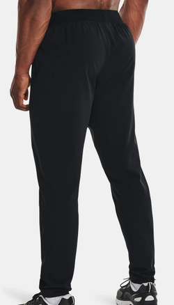 Мужские теннисные штаны Under Armour Men's UA Unstoppable Tapered Pants - black/pitch gray