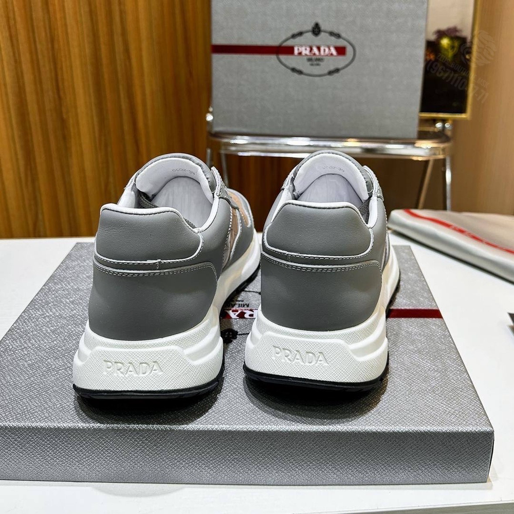 Кроссовки Prada