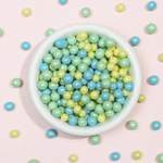 Шарики кранч бирюза, желтый, изумруд микс 100 гр.