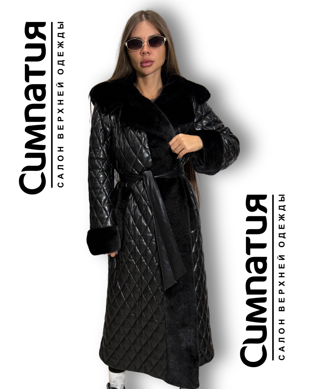 Стильное пальто в черном цвете с декоративными рукавами