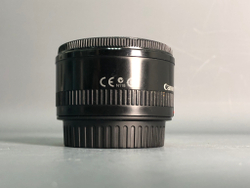 Canon 50mm 1.8 II незначительное количество пыли