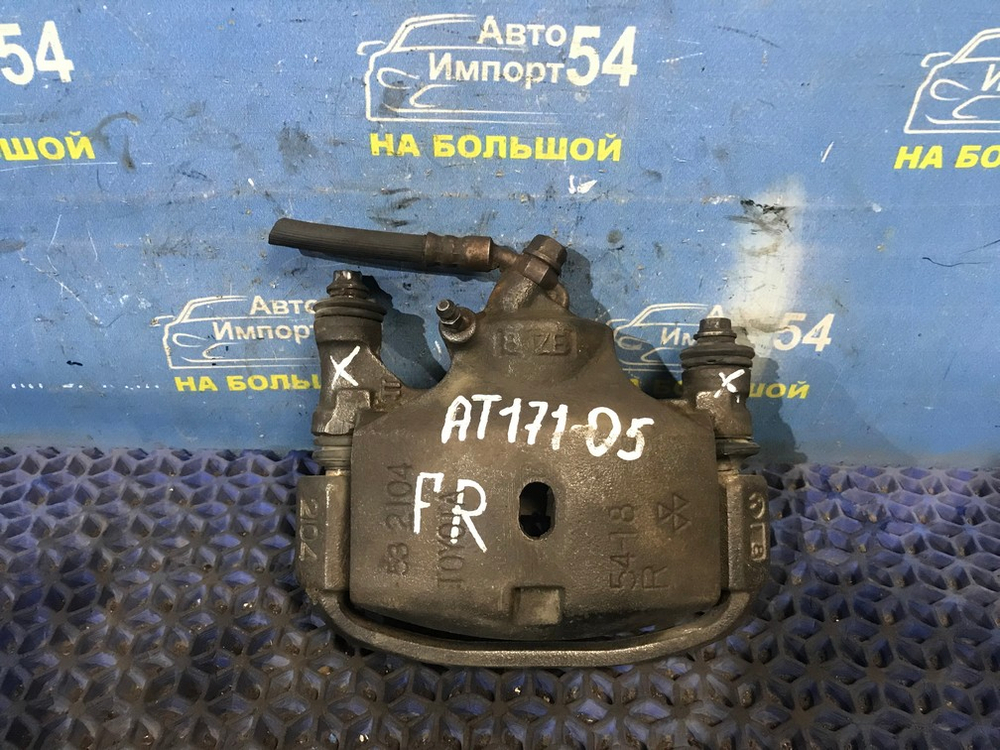 Суппорт тормозной передний правый TOYOTA CARINA 1990