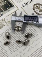 Пуговицы серебристые овальной формы