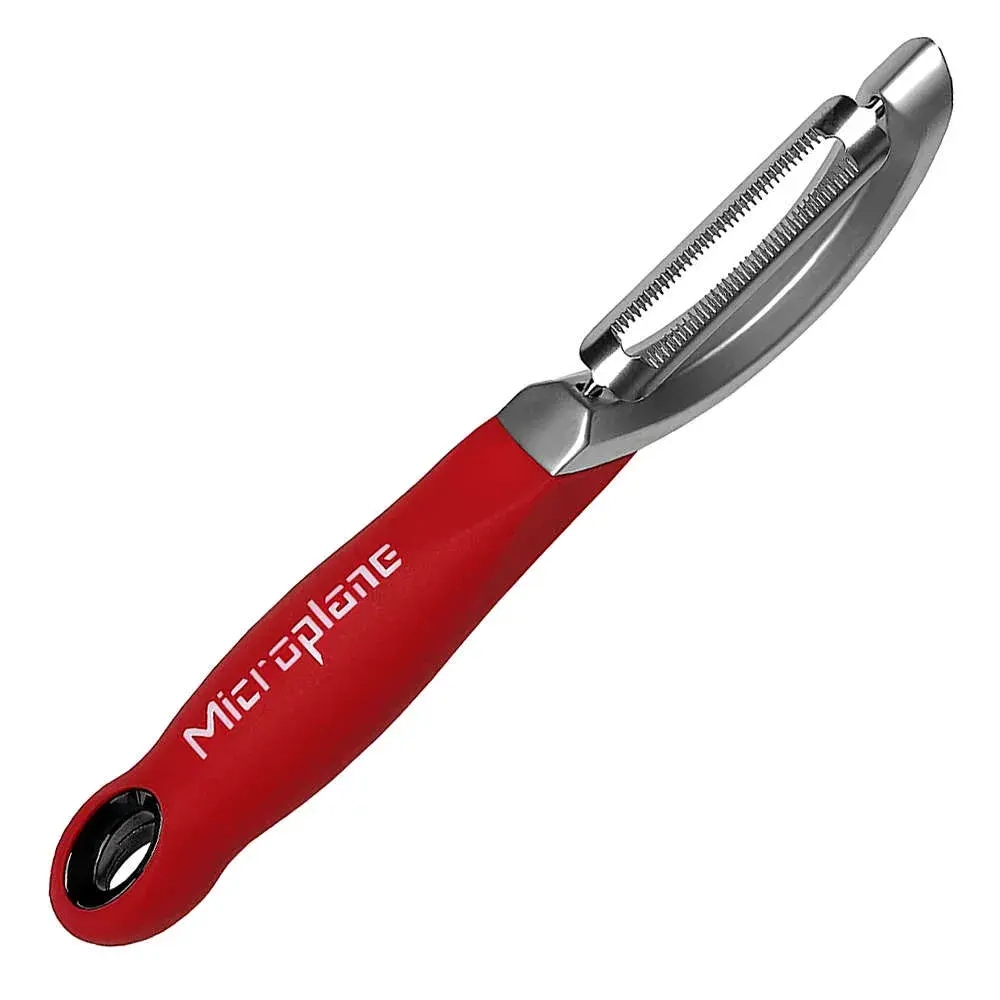Microplane Специальная вертикальная овощечистка.
