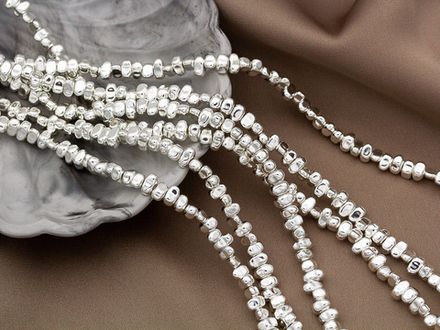 Нить гематитовых бусин, "Freeform" 5,5-6мм