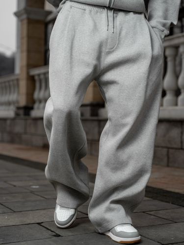 Серые спортивные брюки с защипами Laine