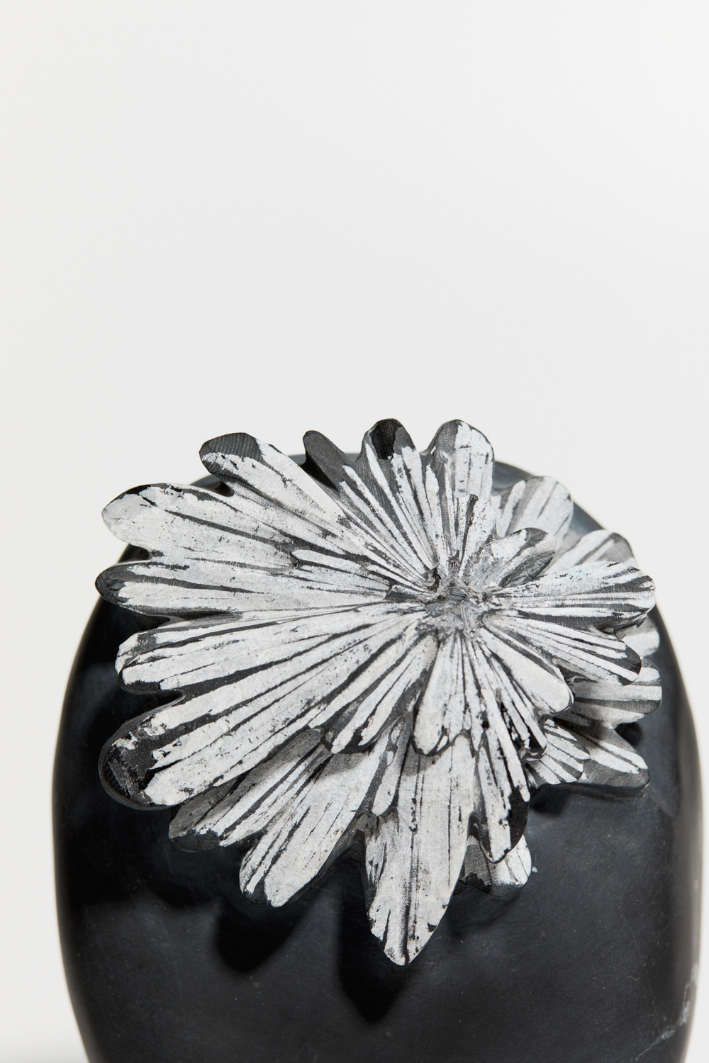 Хризантемный камень