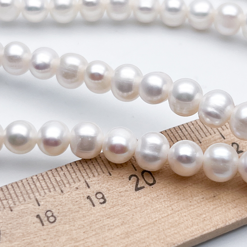 Жемчуг, размер около 7-7,8 мм, цена за отрезок 19 см (1/2 нити)