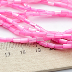 Перламутр тонированный, цвет фуксия, размер около 5*2,8 мм, цена за отрезок 36-37 шт (1/2 нити)