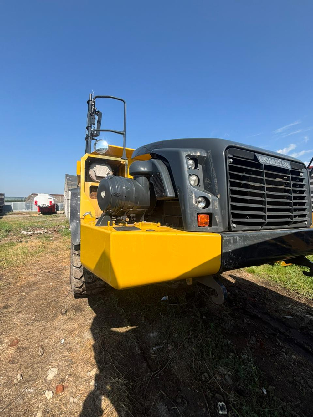 KOMATSU HM400* Шарнирно-сочленённый самосвал HM400-5 (Дизельный, 15,2 л, 480 л.с., АТ)