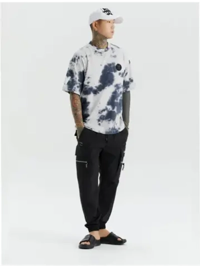 Брюки джоггеры с карманами на молнии