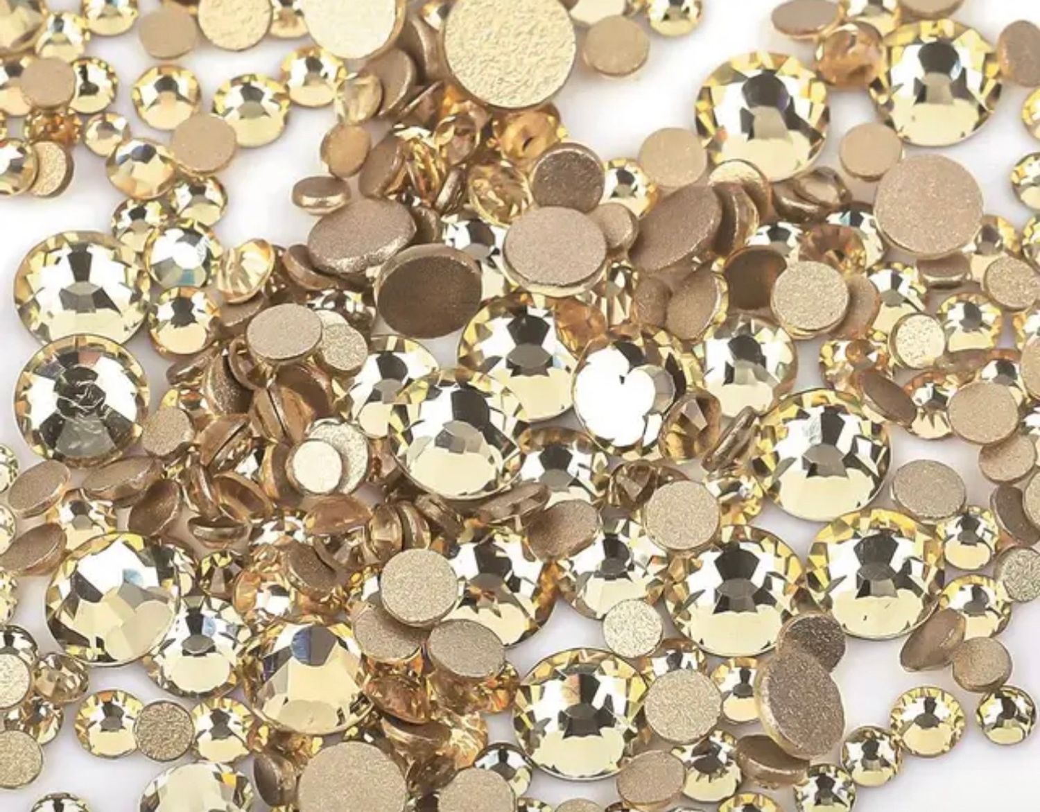 Стеклянные стразы  (размер микс) 1140шт, цвет золото