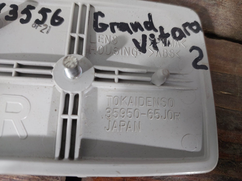 Катафот заднего бампера левый Suzuki Grand Vitara 2 (JT) 05-08 Б/У Оригинал 3595065J0