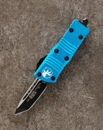 Автоматический складной нож Microtech Mini Troodon Black Tanto 240-1BL (голубой) фронталка/выкидуха
