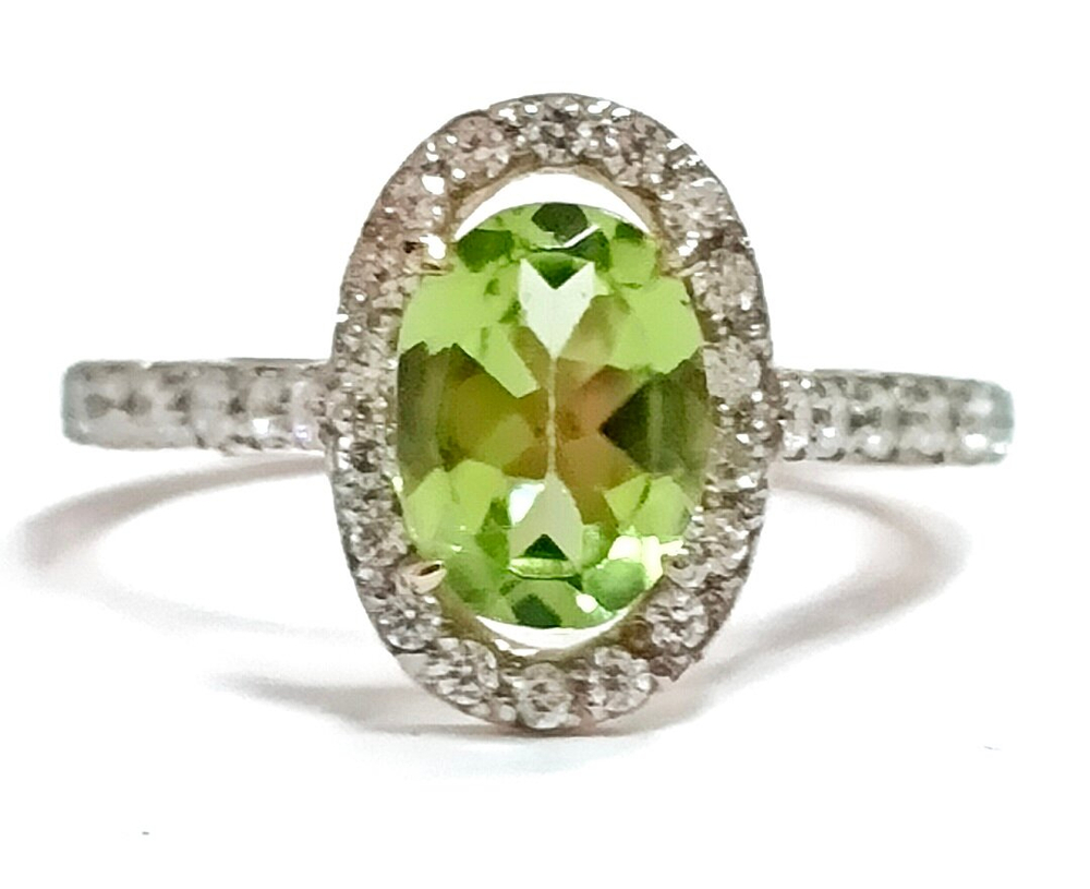 Ювелирное кольцо из серебра с позолотой,вставка хризолит,фианиты