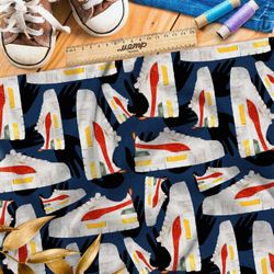 Ткань атлас белые кроссовки с ярким рисунком на синем фоне