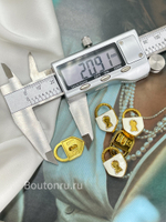 Пуговицы замочек золотистые с белой эмалью Скиапар.