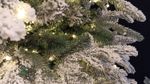 Заснеженная ель с гирляндой «Россо» теплый свет (Литая+пвх) от 1.2 до 2.4 м
