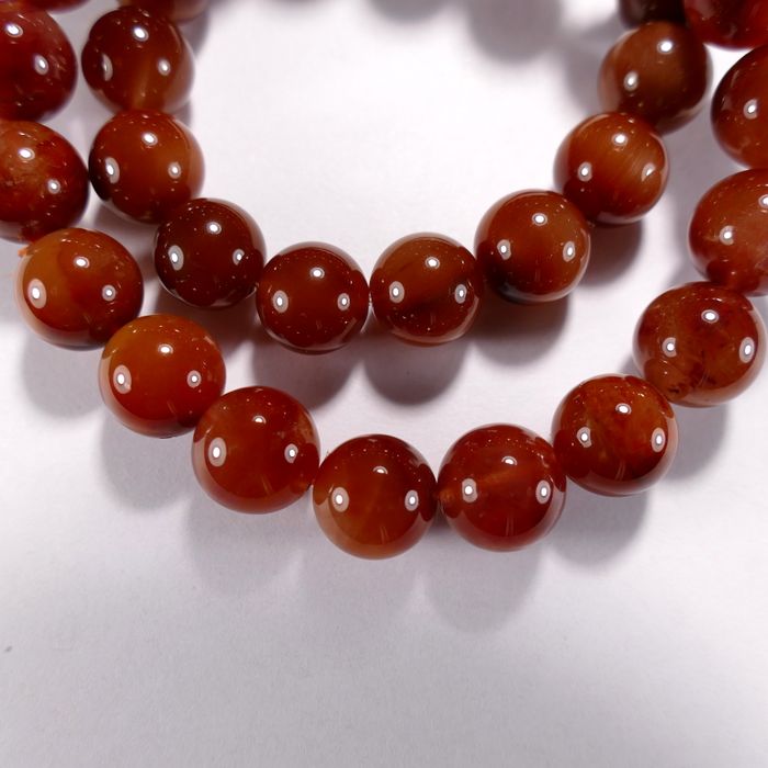 Бусина из кварца красного с нигрином, класс АА, шар гладкий 10 мм