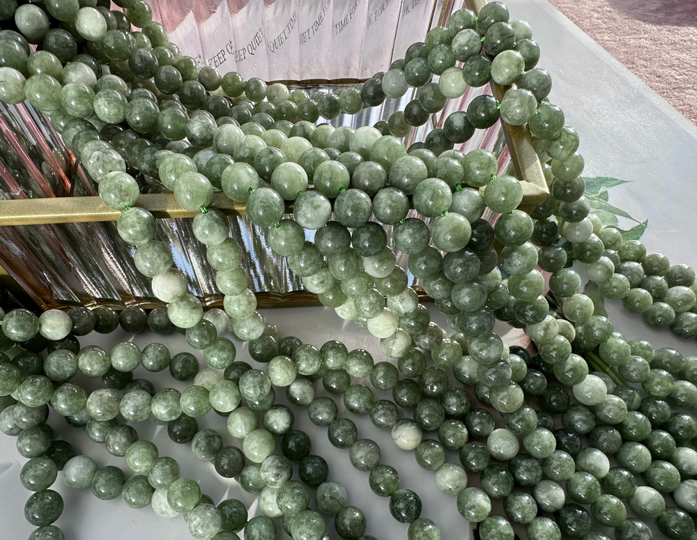 Нить бусин из тонированного кварца 8мм, гладкие