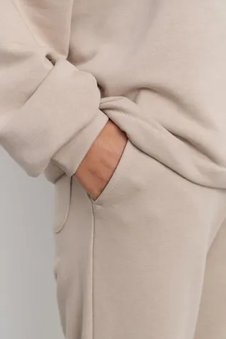 Свободные джоггеры без начеса из премиум футера серо-бежевого цвета