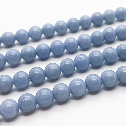 Ангелит бусины, диаметр около 6,4-6,6 мм, цена за 14-15 шт (1/4 нити)