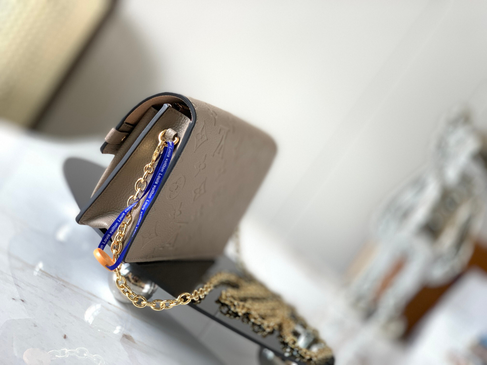 Louis Vuitton Vavin Chain Wallet