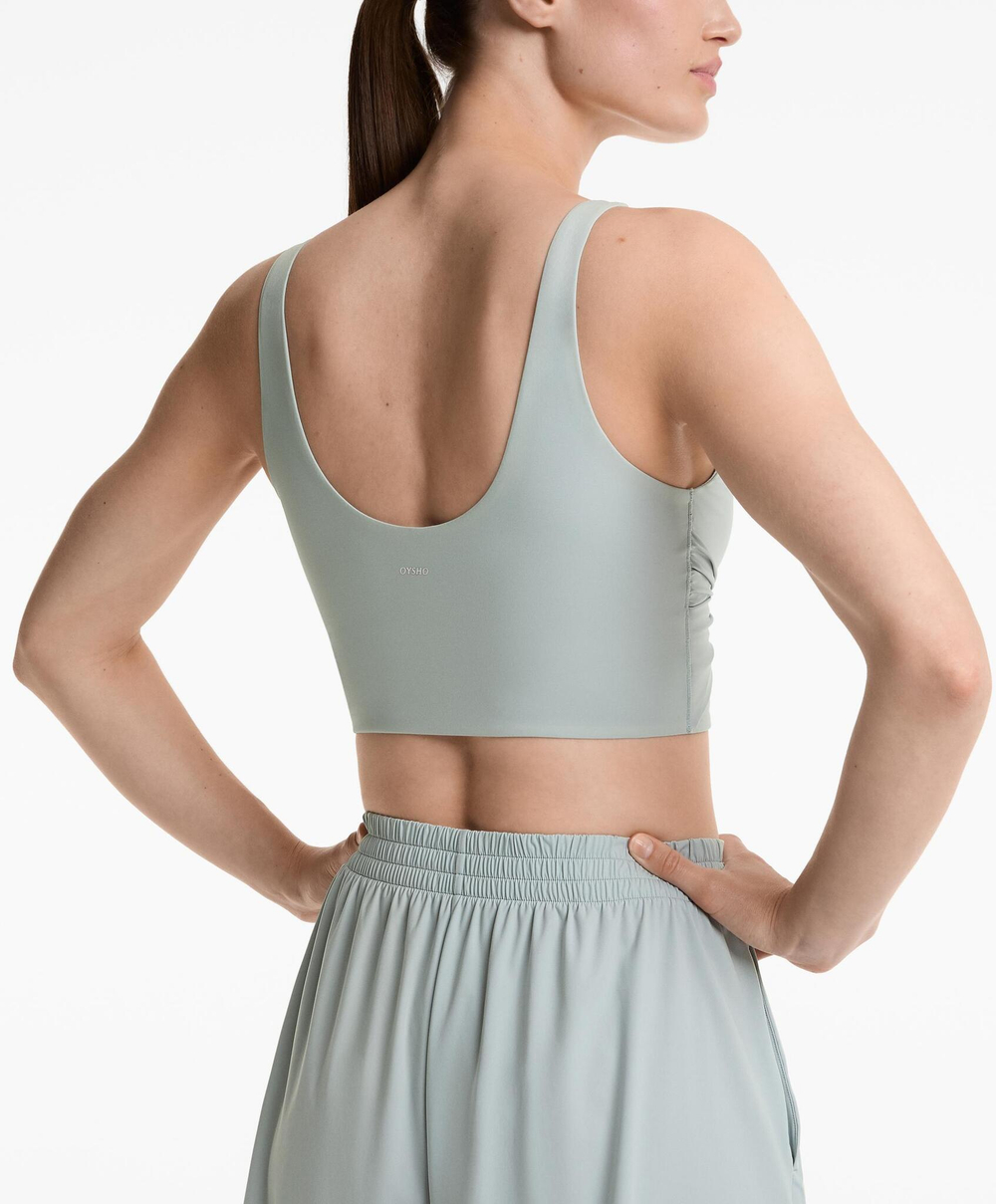 Oysho Топ-майка Light Touch с перекрестными деталями, светло-бирюзовый