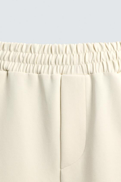 ZARA ДЖОГГЕРЫ ИЗ ВЫСОКОТЕХНОЛОГИЧНОЙ ТКАНИ С ДЕКОРАТИВНЫМИ ШВАМИ, ЭКРЮ