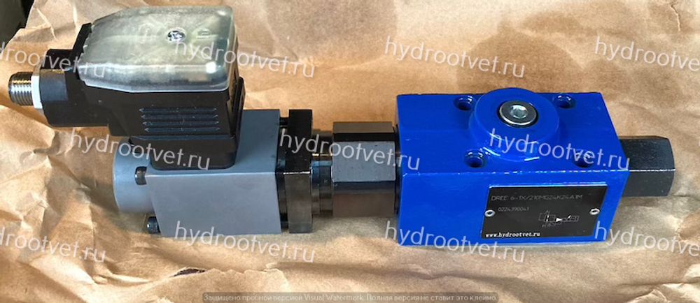 DREE6-1X/210MG24K24A1M - Пропорциональный редукционный клапан Ду6 со встроенным усилителем, сигнал A1 = 0-10В, давление регулировки до 210 бар, монтаж - на плиту