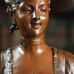 Бюст девушки в шляпке